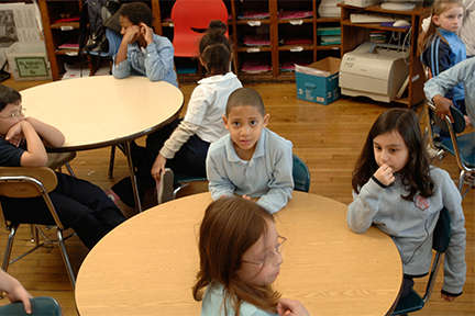 Students sitting at a classroom table