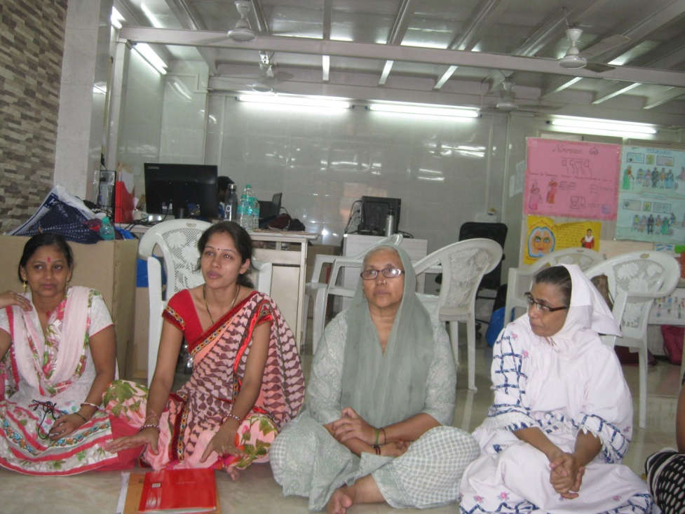 Four women of India Marketplace siting together