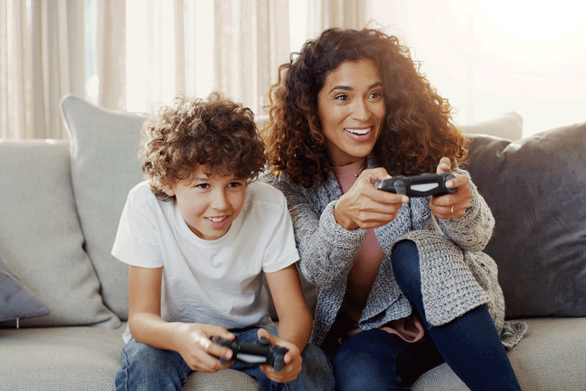 Mother and son play video games