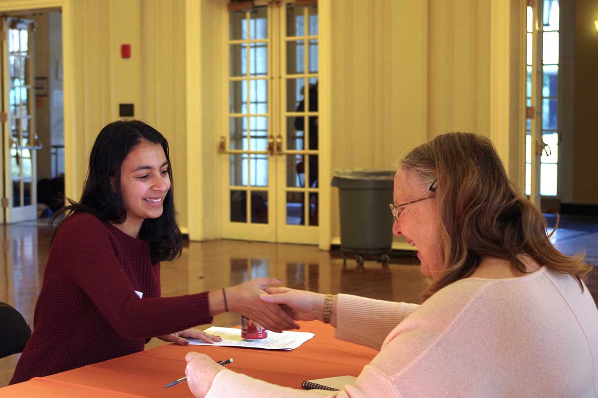 Wellesley College student talks with researcher Wendy Wagner Robeson about a research internship.