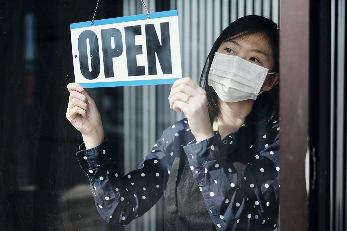 02 woman mask opens store web