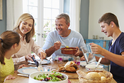 a family sitting around a table