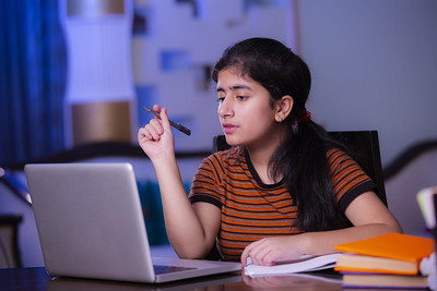 Middle School girl working on a computer