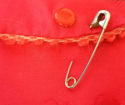 Go ahead, wear a safety pin. But don't expect people of color to