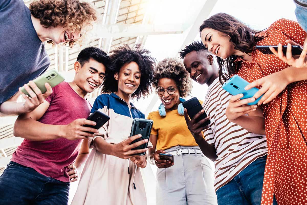 Diverse teens using technology