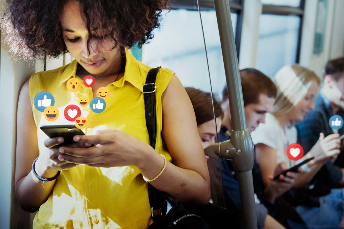 woman using social media on public transit