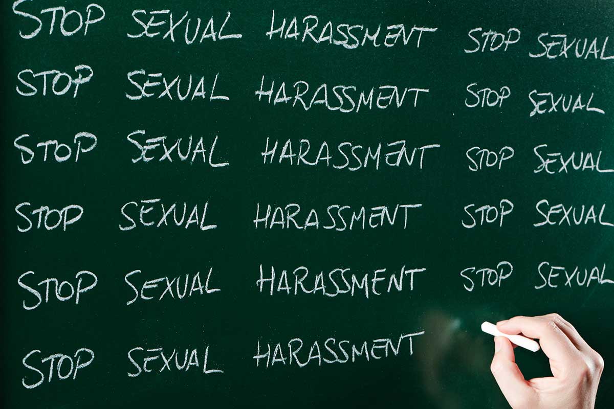 Stop sexual harassment written on chalkboard