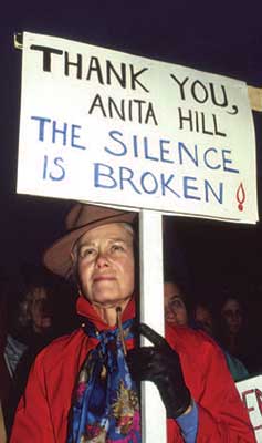 Protester with AH Sign